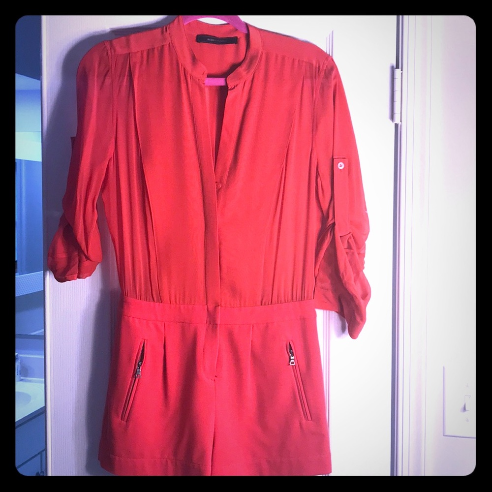 BCBB Max Azria jumpsuit in red.